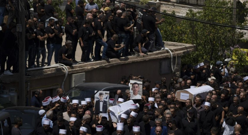 დაკრძალეს სარაკეტო შეტევების შედეგად დაღუპული ისრაელელი არასრულწლოვანები