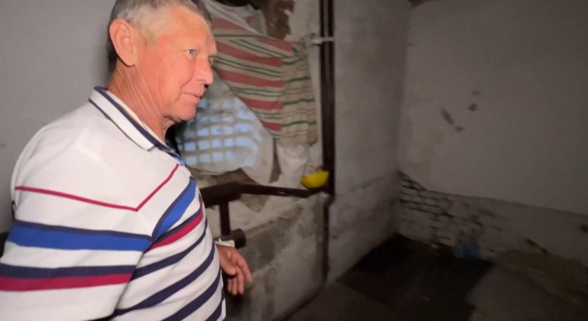 ქალაქ იზიუმში ადგილობრივები რუსების მიერ ჩადენილი დანაშაულების შესახებ ჰყვებიან